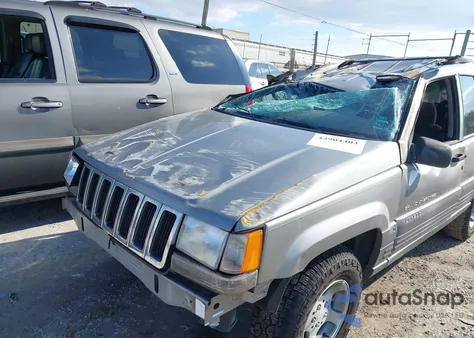 1998 Jeep Grand Cherokee Laredo from USA, damaged, VIN 1J4GZ58S5WC106520